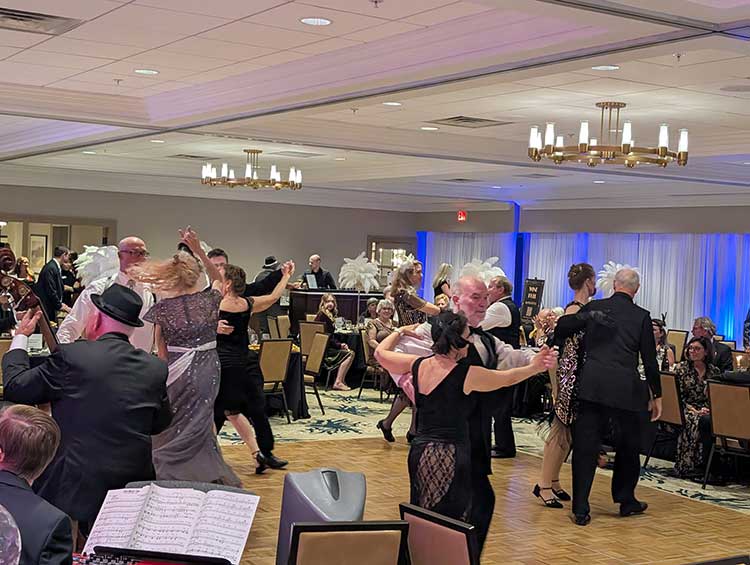 Fall Ball: attendees dancing in black tie attire